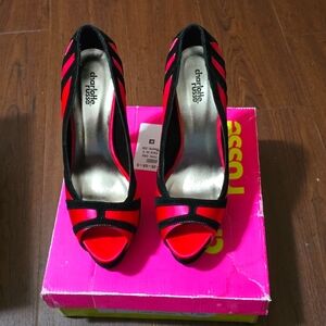 Pink and black heels